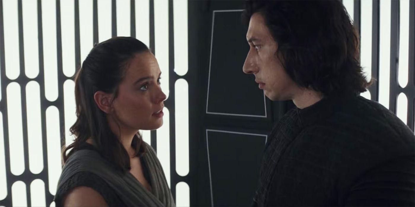Daisy Ridley and Adam Driver as Rey and Kylo Ren looking at each other in Star Wars: The Last Jedi