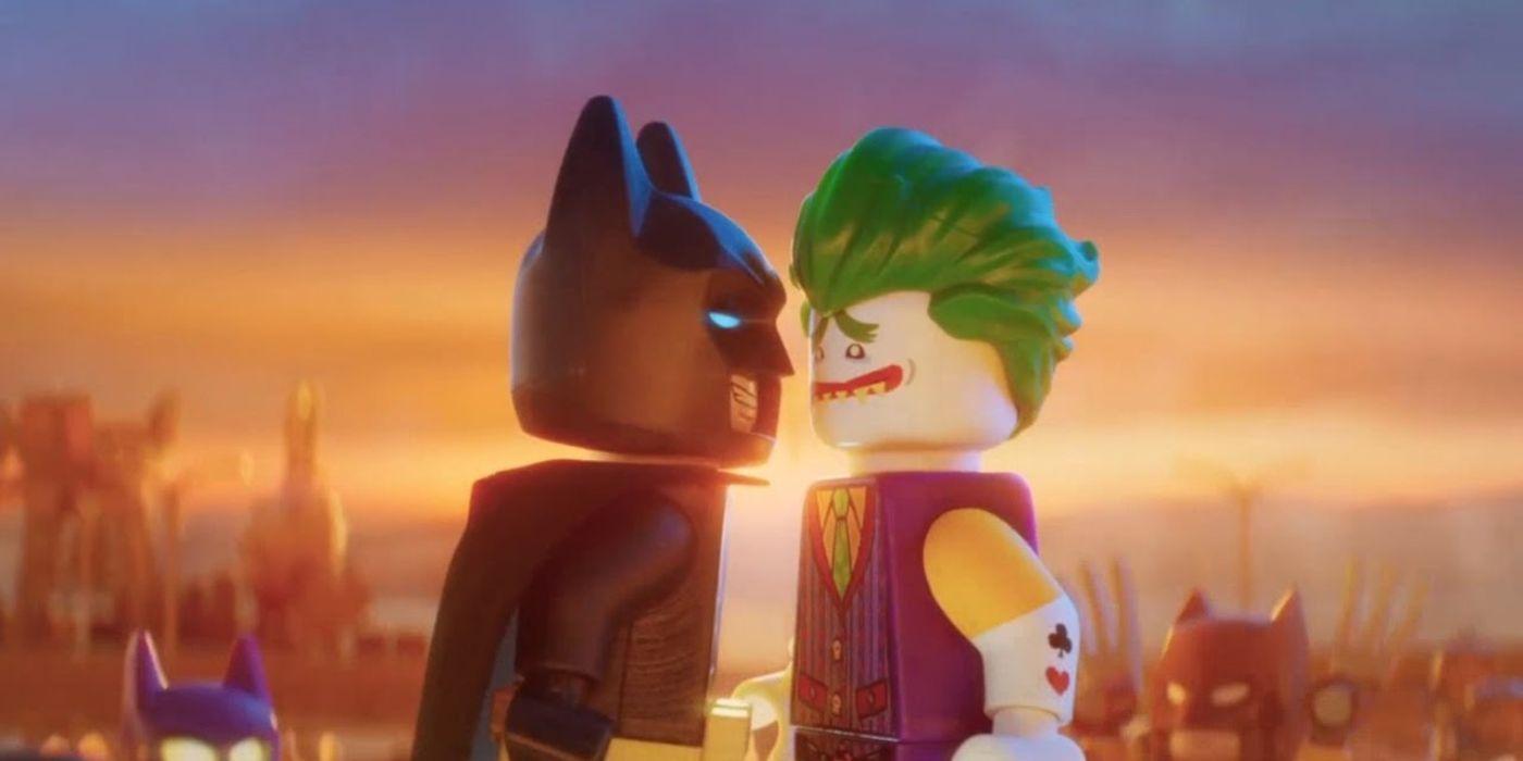 Zach Galifianakis' joker and Will Arnett's Batman standing close and facing each other in The Lego Batman Movie